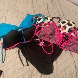 Black op bikini bottom with 4 bikini tops